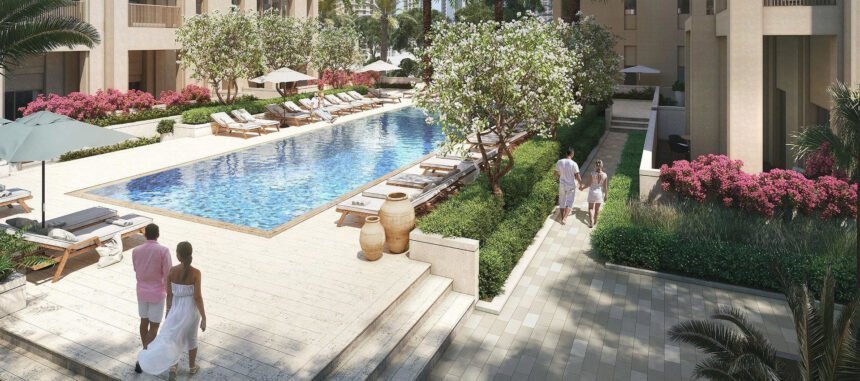 Swimming pool with sun loungers and relaxation areas