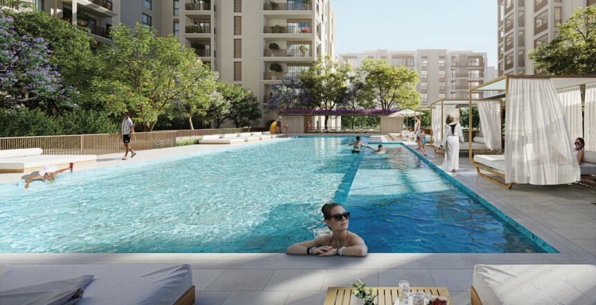 Outdoor swimming pool with sunbathing area
