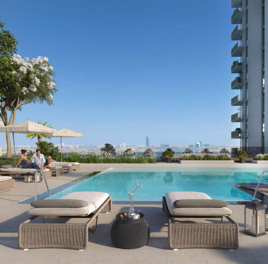 Infinity pool with sun loungers and a lounge area