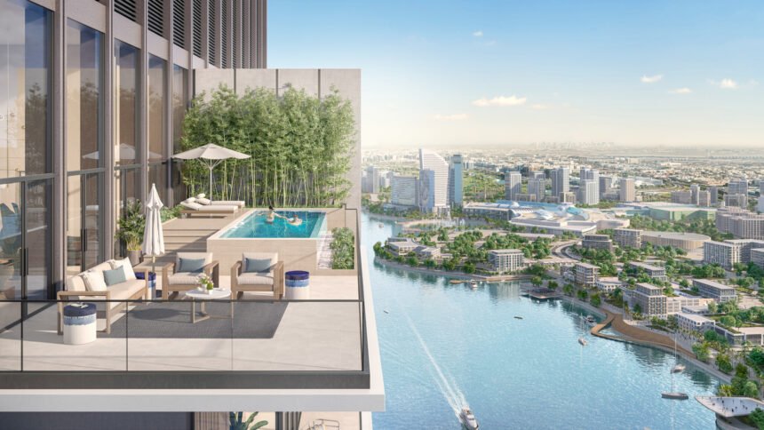 Infinity pool with elegant loungers overlooking the waterway