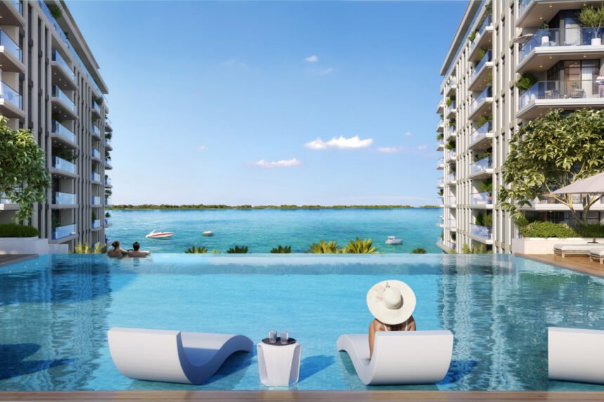 Infinity pool overlooking the promenade and waterway